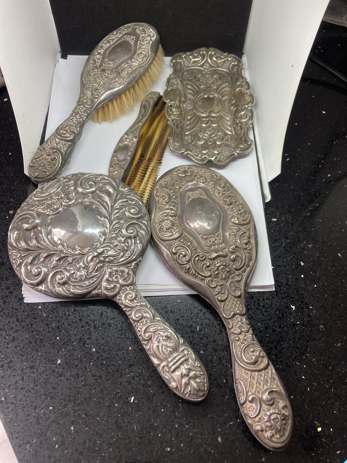 FIVE PIECES OF HALLMARKED BIRMINGHAM SILVER TO INCLUDE A BRUSH, TWO MIRRORS, A COMB AND A TRAY