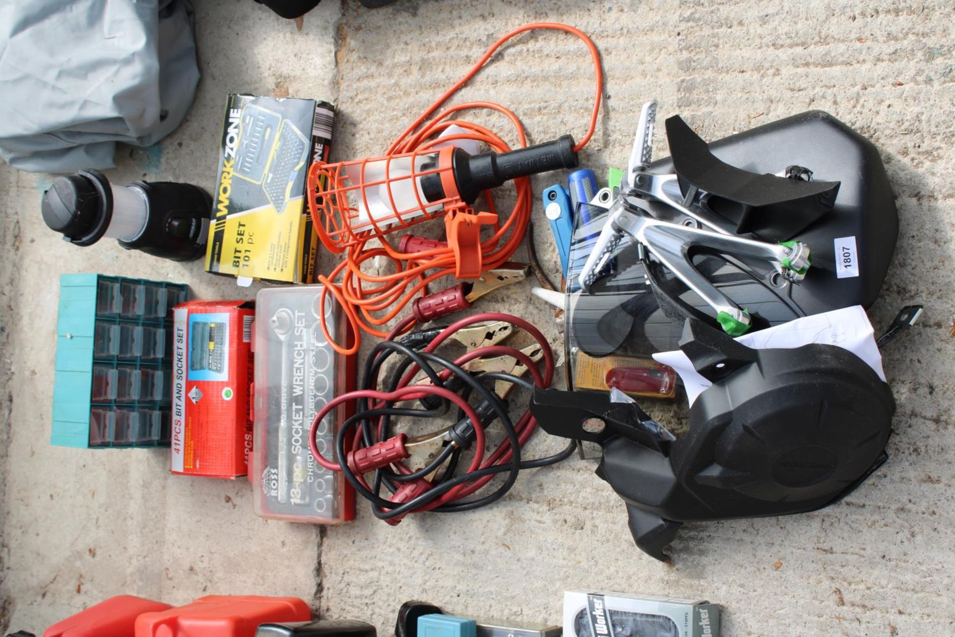 AN ASSORTMENT OF TOOLS TO INCLUDE JUMP LEADS, MOTORBIKE SPARES AND SOCKET SETS ETC