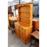 A PINE DRESSER WITH PLATE RACK, 39" WIDE