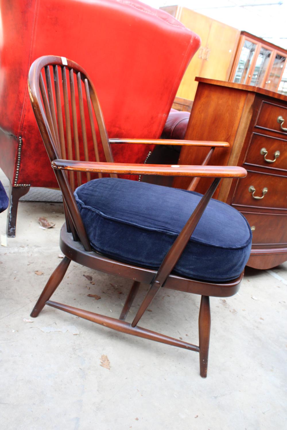 AN ERCOL STYLE FIRESIDE CHAIR WITH SPINDLE BACK - Image 2 of 3