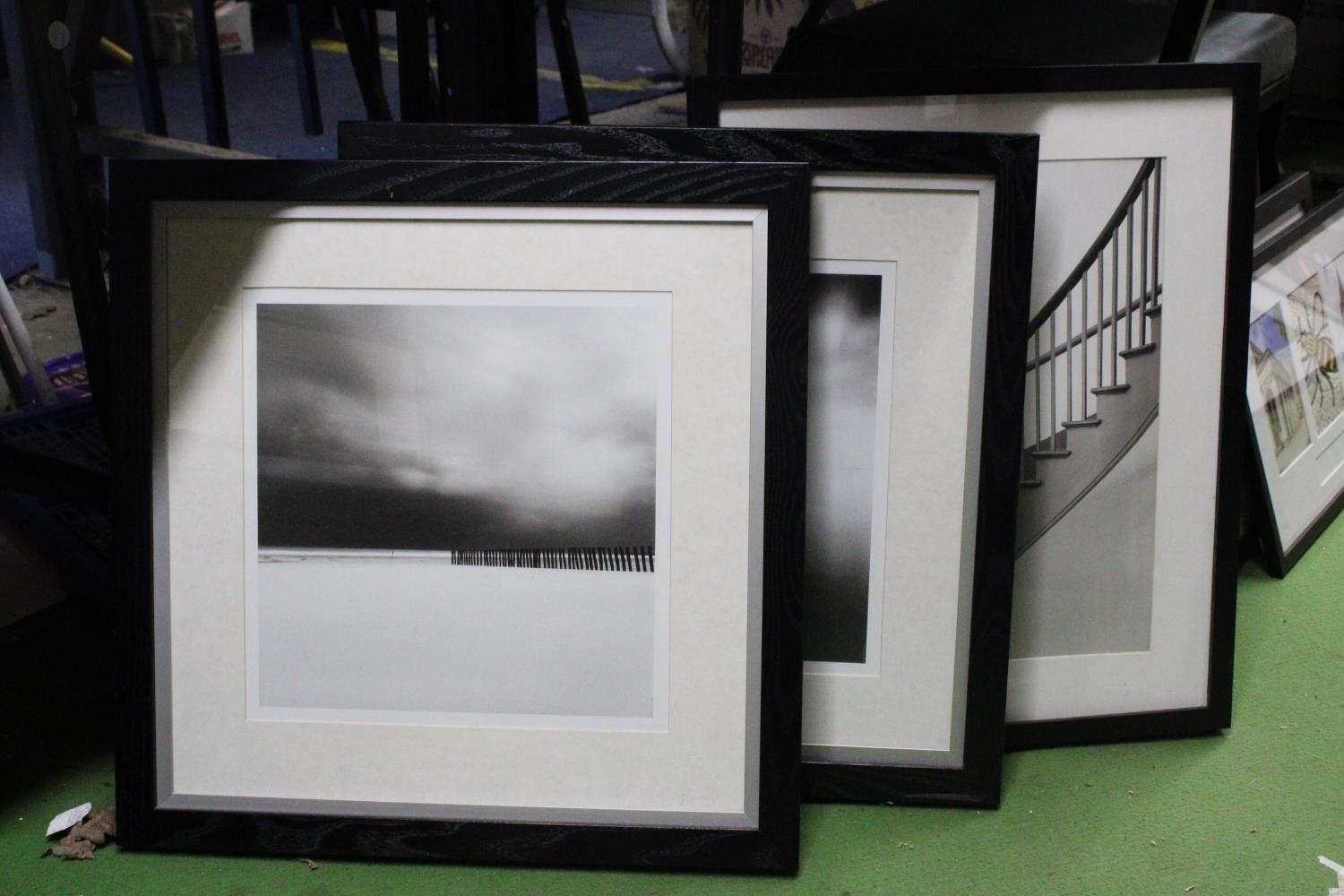 THREE MODERN MONOCHROME FRAMED PRINTS TO INCLUDE TWO SEASCAPE SCENCE PLUS STAIRCASE