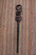 A HAND CARVED AFRICAN WALKING STICK, WITH ELEPHANT FIGURES TO THE TOP, WITH THE INSCRIPTION 'KARIBU,