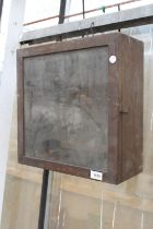 A VINTAGE WOODEN GLASS FRONTED WALL MOUNTED DISPLAY CABINET