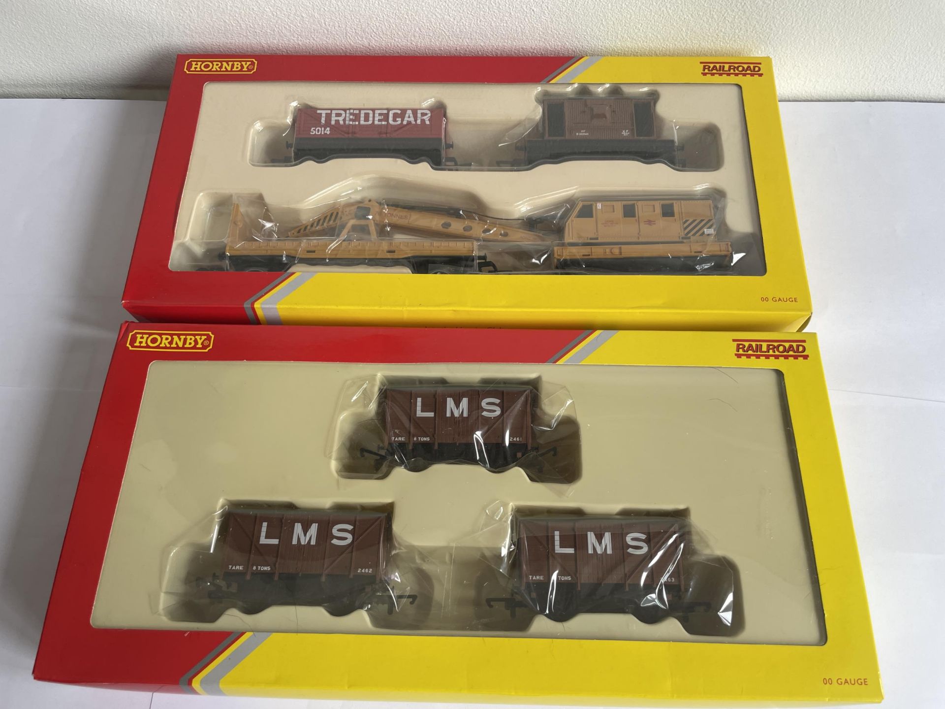 TWO AS NEW AND BOXED HORNBY 00 GAUGE SETS TO INCLUDE THE BREAKDOWN PACK AND A PACK OF THREE LMS