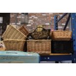 TWELVE WICKER BASKETS OF VARIOUS SHAPES AND SIZES