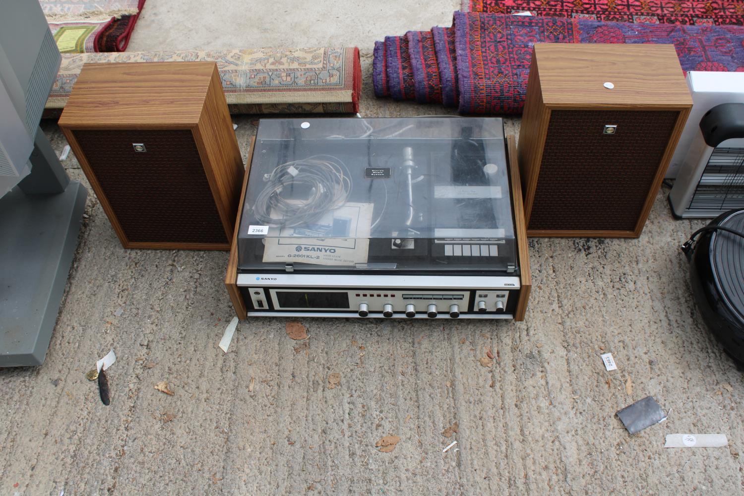 A SANYO G-2601KL-2 RECORD PLAYER AND A PAIR OF SANYO WOODEN CASED SPEAKERS