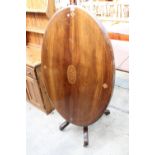 A VICTORIAN WALNUT AND INLAID OVAL LOO TABLE 46" X 31"
