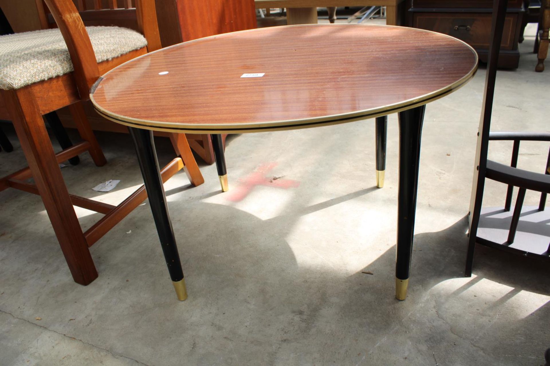 A RETRO TEAK McINTOSH CARVER CHAIR AND 28" DIAMETER FORMICA TOP COFFEE TABLE ON BLACK TAPERING LEGS - Image 2 of 3