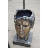 A LOW FIBRE GLASS GREEK GOD HEAD PLANTER