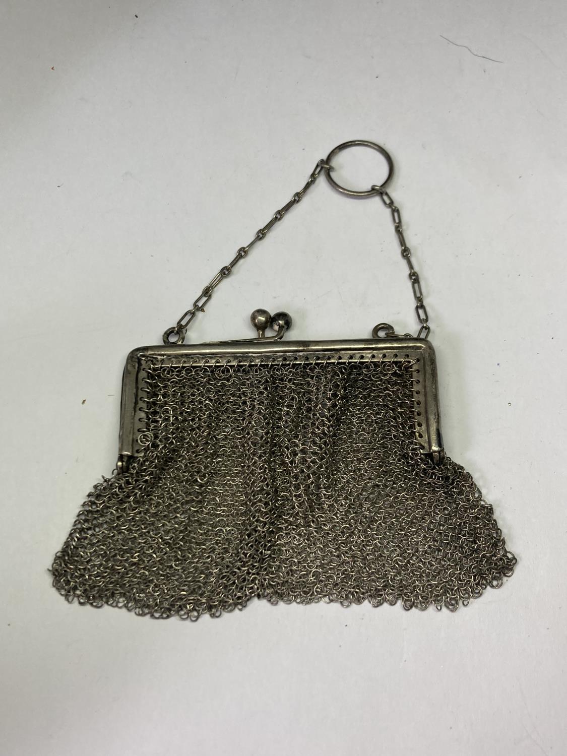 A VICTORIAN SILVER PURSE