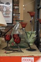 A THREE MODERN GLASS FLOWER DESIGN METAL CANDLE HOLDERS PLUS LARGE GLASS VASE