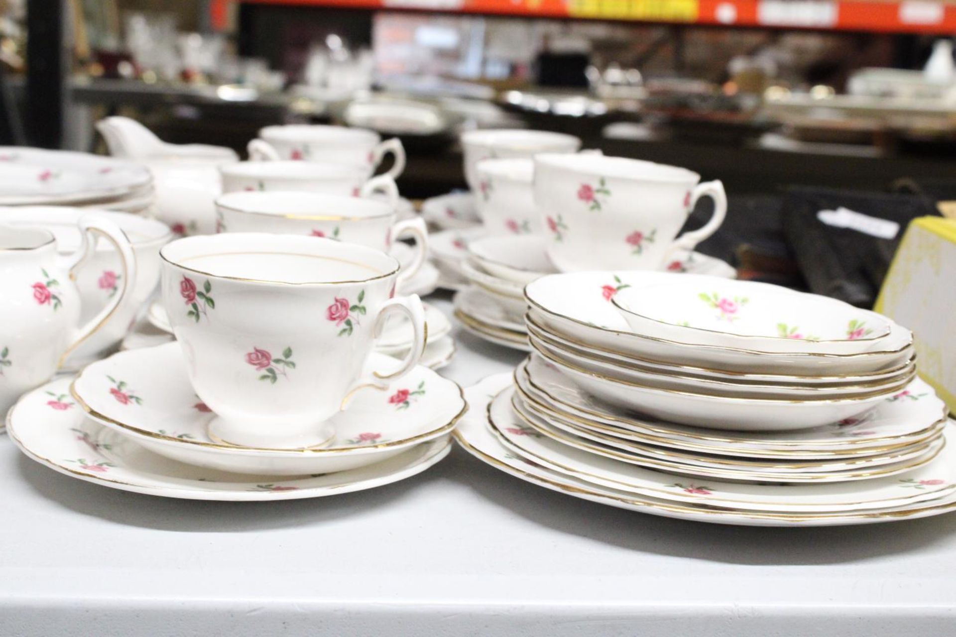 A VINTAGE COLCLOUGH CHINA TEASET, WITH ROSE PATTERN TO INCLUDE PLATES, CREAM JUGS, A SUGAR BOWL, - Image 5 of 5