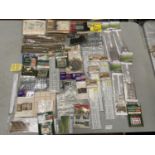 A LARGE COLLECTION OF RAILWAY ACCESSORIES TO INCLUDE MAINLY FENCING KITS, PALLETS, MAIL BAGS ETC.