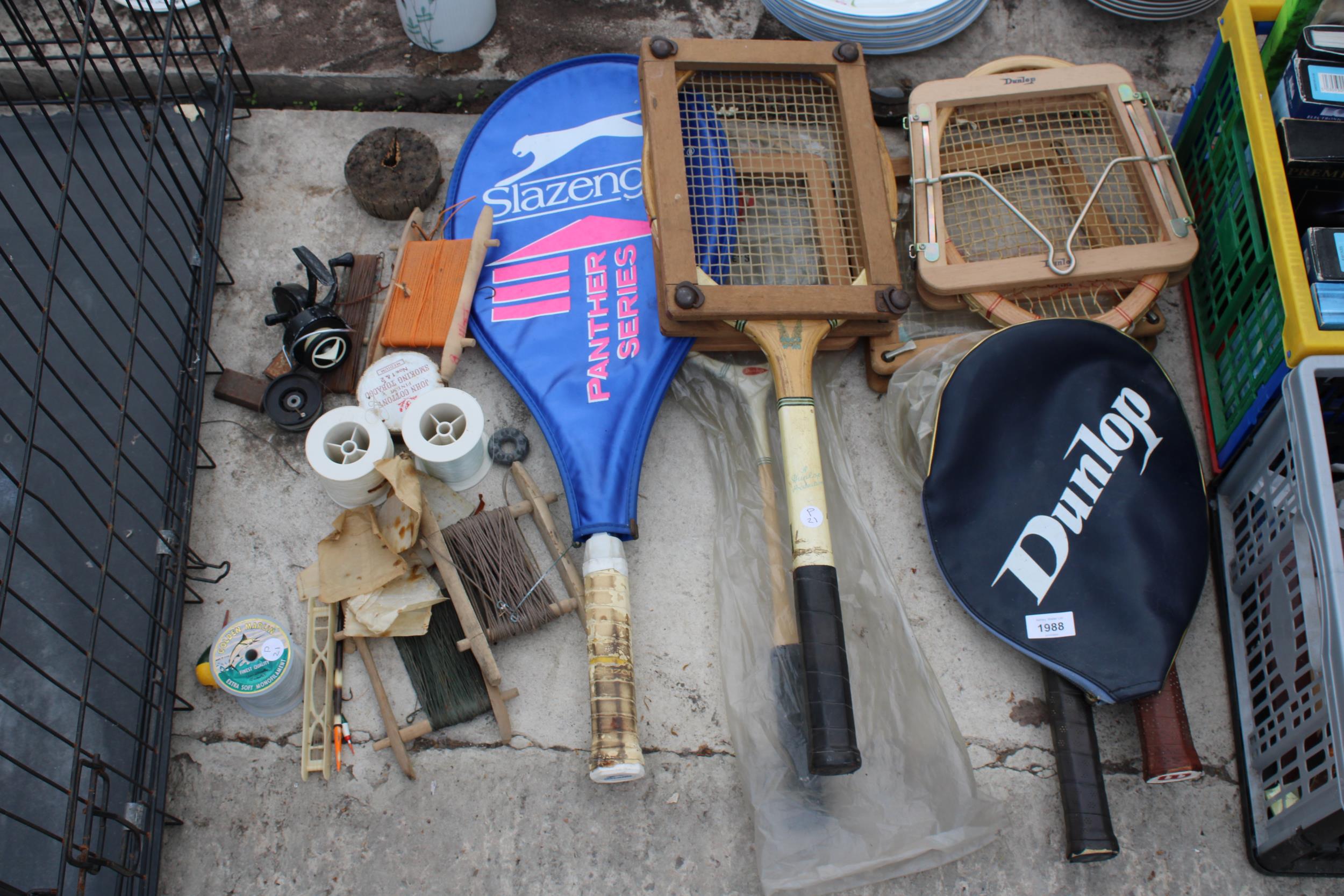 AN ASSORTMENT OF TENNIS RACKETS AND FISHING TACKLE