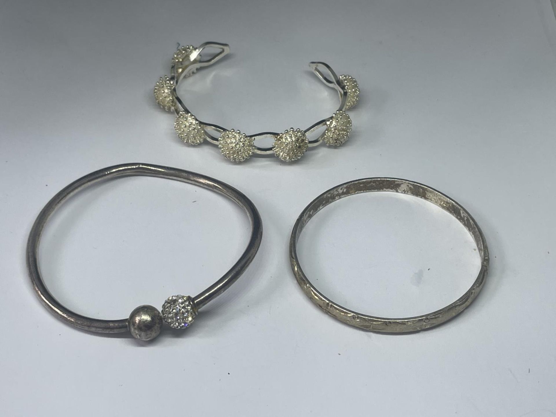 THREE SILVER BANGLES