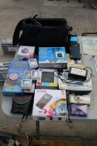 AN ASSORTMENT OF ITEMS TO INCLUDE A KODAK ZX1 POCKET VIDEO CAMERA, CAMERAS AND A PHOTO PRINTER ETC