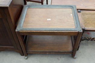 A MID 20TH CENTURY TWO TIER TROLLEY WITH LIFT-OUT PEWTER FRAMED TRAY