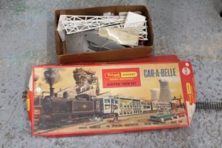 A VINTAGE TRI-ANG HORNBY, CAR-A-BELLE ELECTRIC TRAIN SET PLUS A QUANTITY OF ACCESSORIES