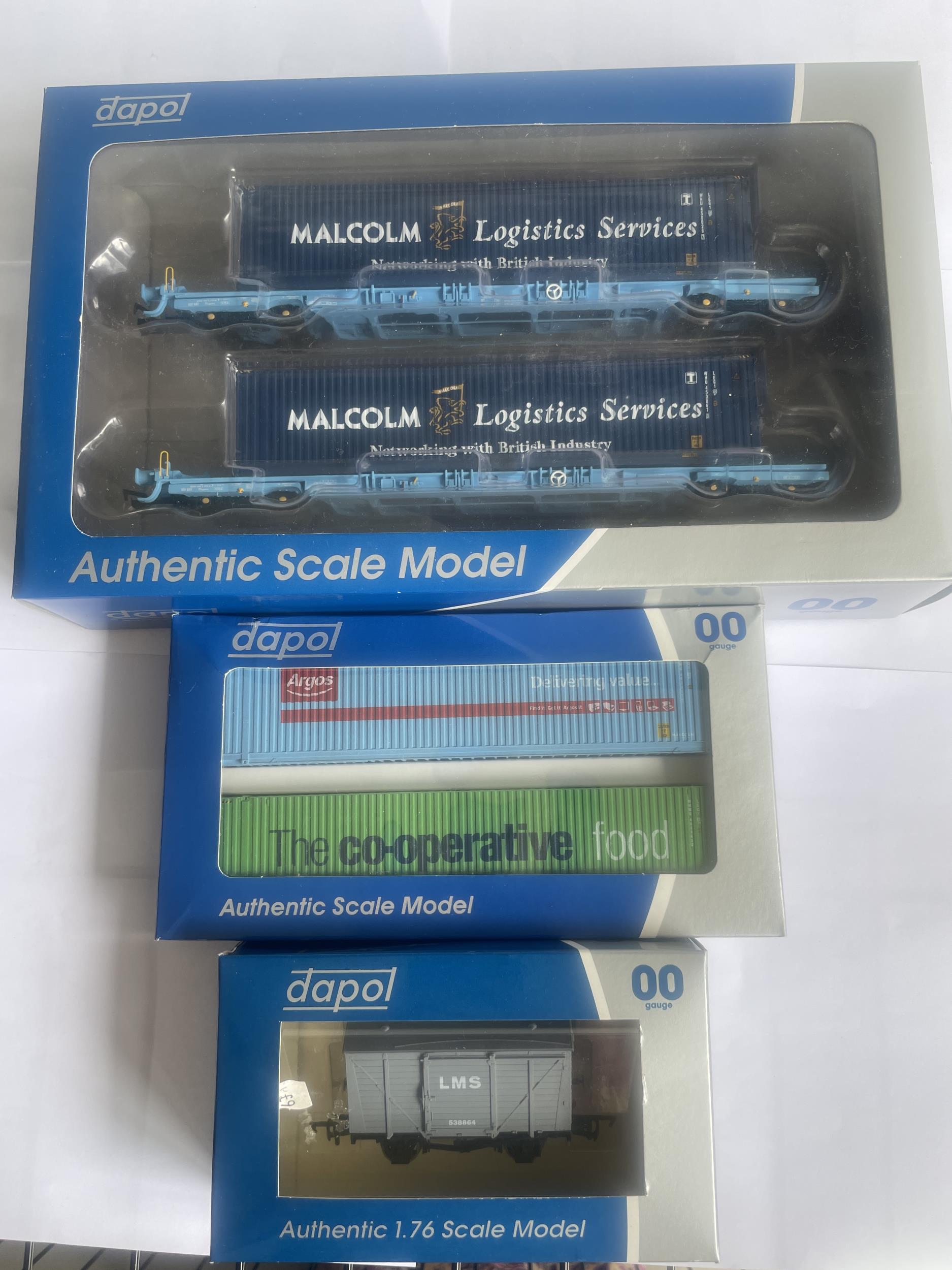 THREE BOXED DAPOL 00 GAUGE MODELS TO INCLUDE A TWIN PACK CONTAINERS, TWO MEGAFRET WAGONS WITH