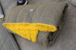 A BELIEVED AS NEW MADE IN TURKEY YELLOW SHAGGY RUG