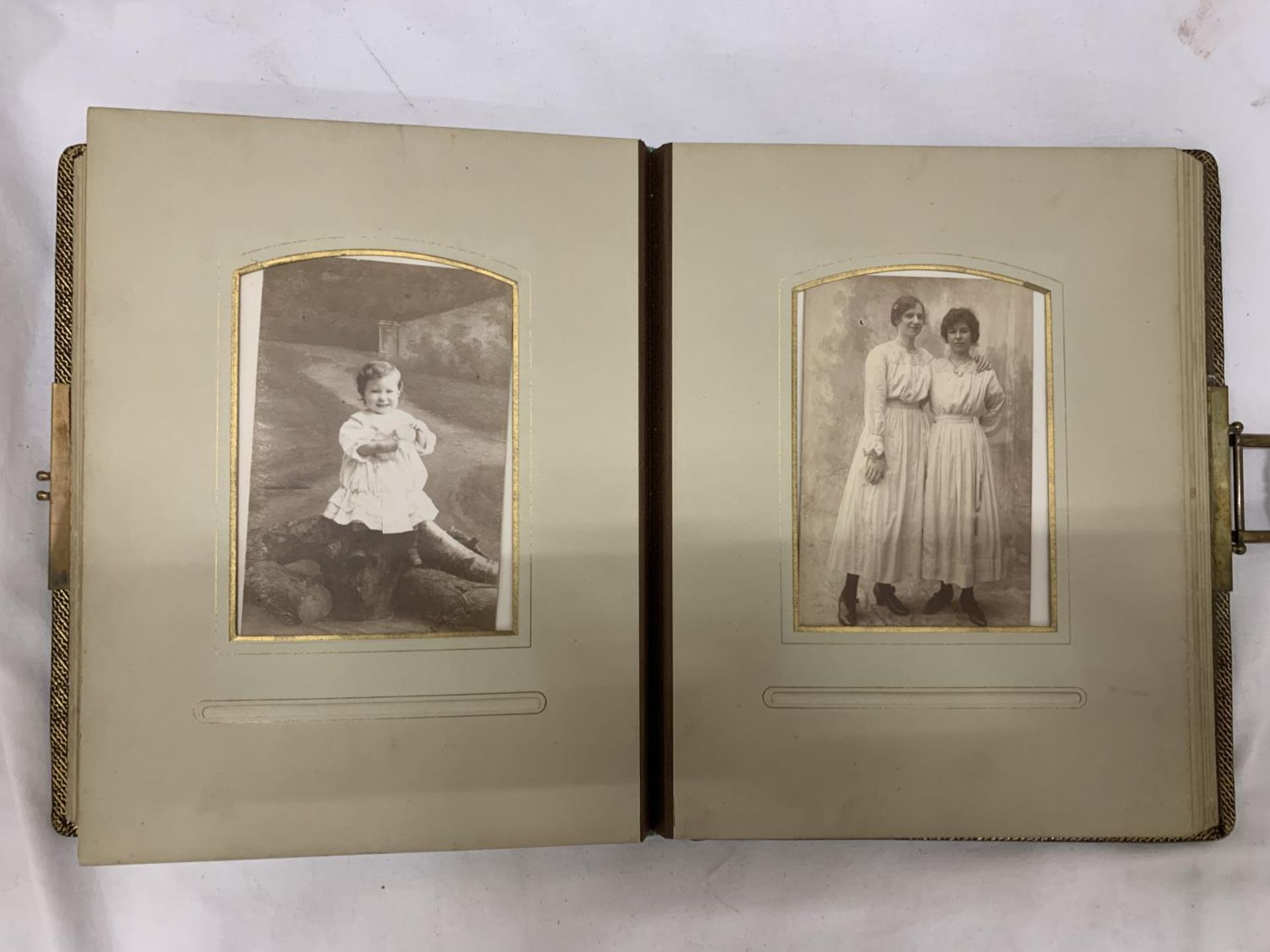 A VICTORIAN LEATHERBOUND PHOTO ALBUM CONTAINING PHOTO'S - Image 11 of 12