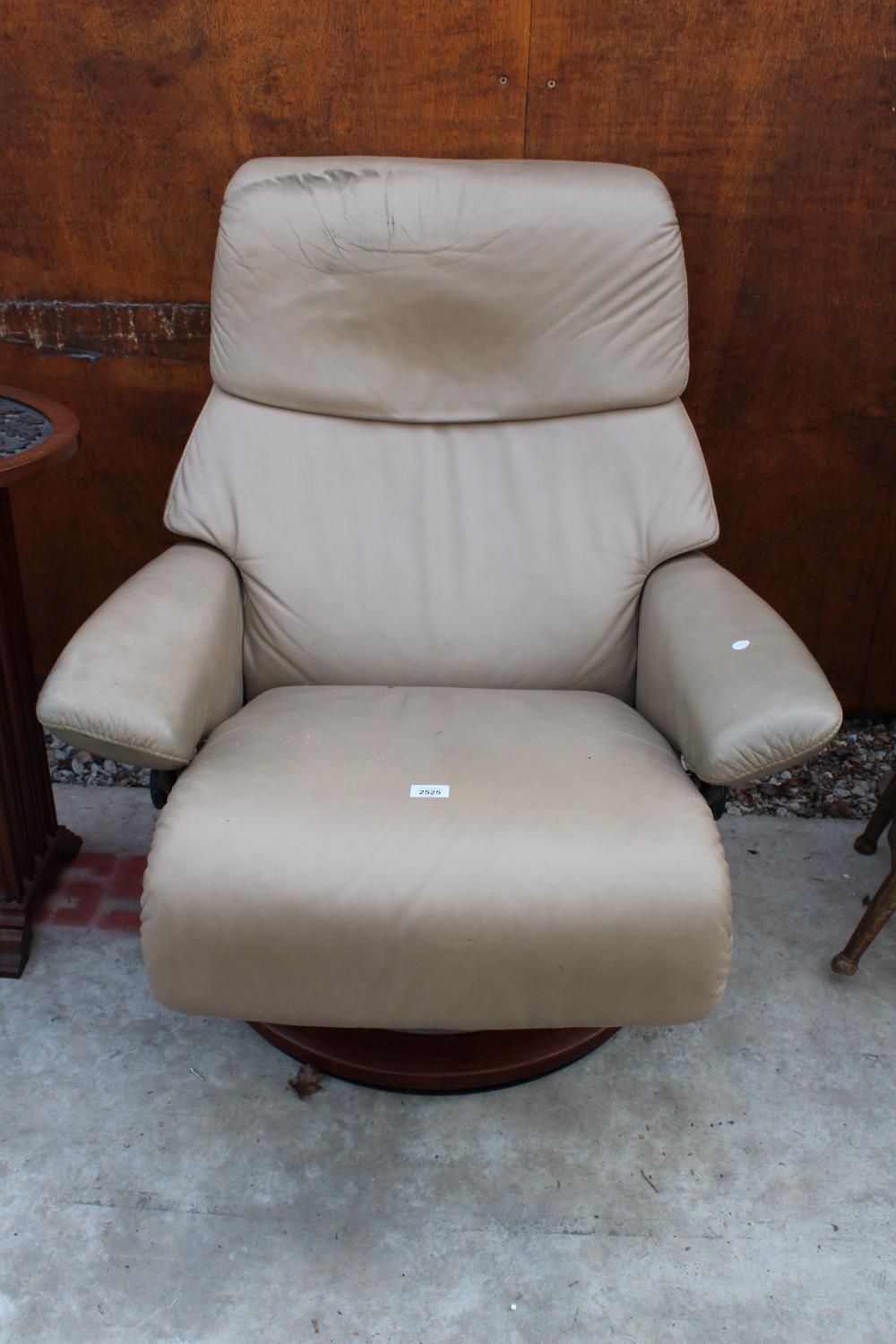 A STRESSLESS EKORNES SWIVEL RECLINER CHAIR