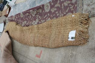 A BELIEVED AS NEW MADE IN INDIA HESSIAN RUG (275CM x 365CM)