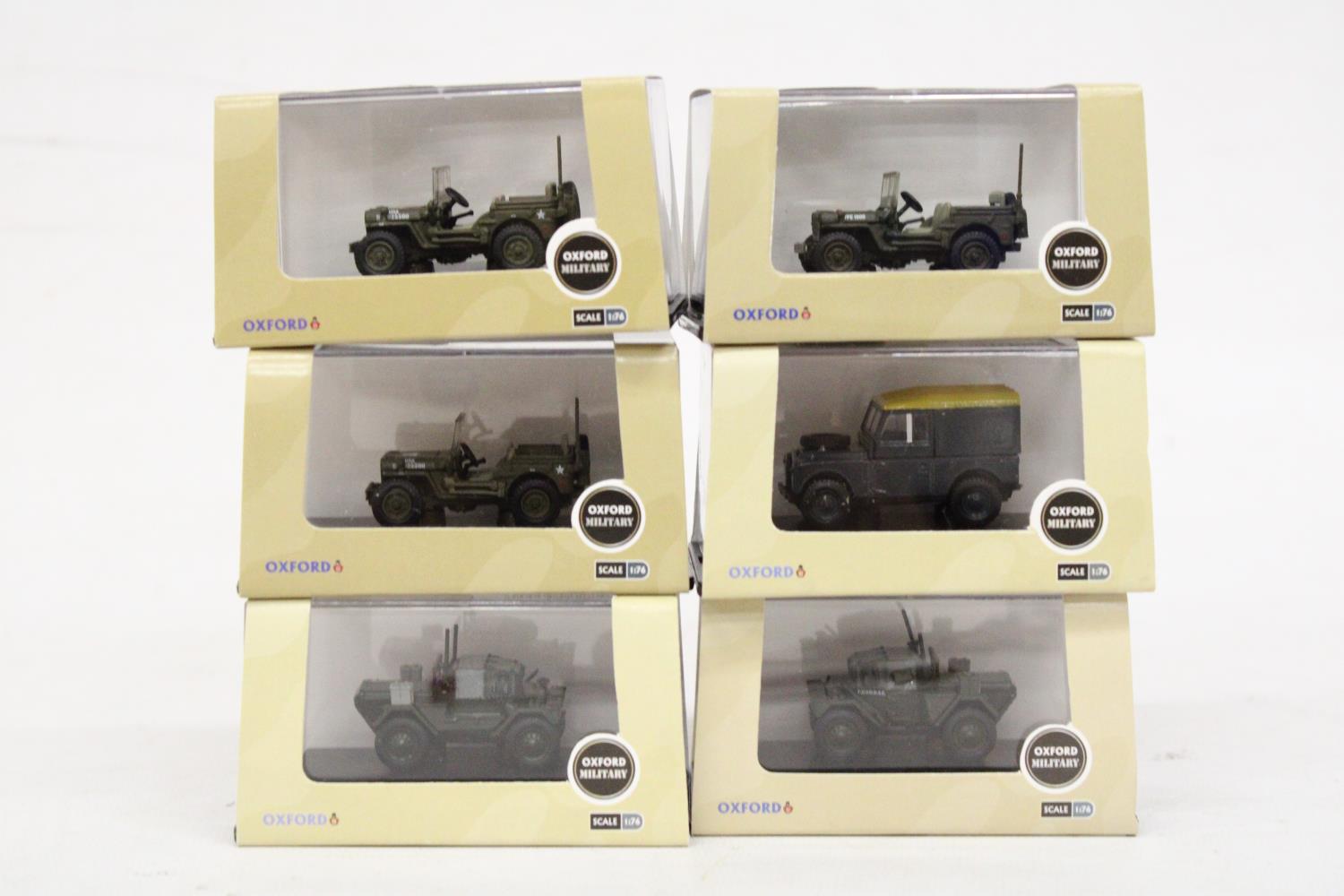 SIX AS NEW AND BOXED OXFORD MILITARY VEHICLES