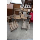 A SET OF FOUR EARLY 20TH CENTURY FOLDING CHILDS CHAIRS