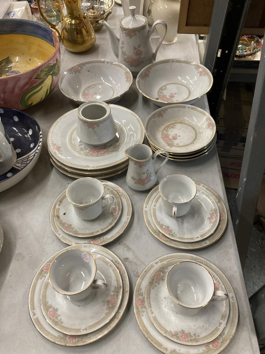 A "CROWN MING T.M" PART TEA/DINNER SET TO INCLUDE A TEAPOT,BOWLS, PLATES, JUG ETC