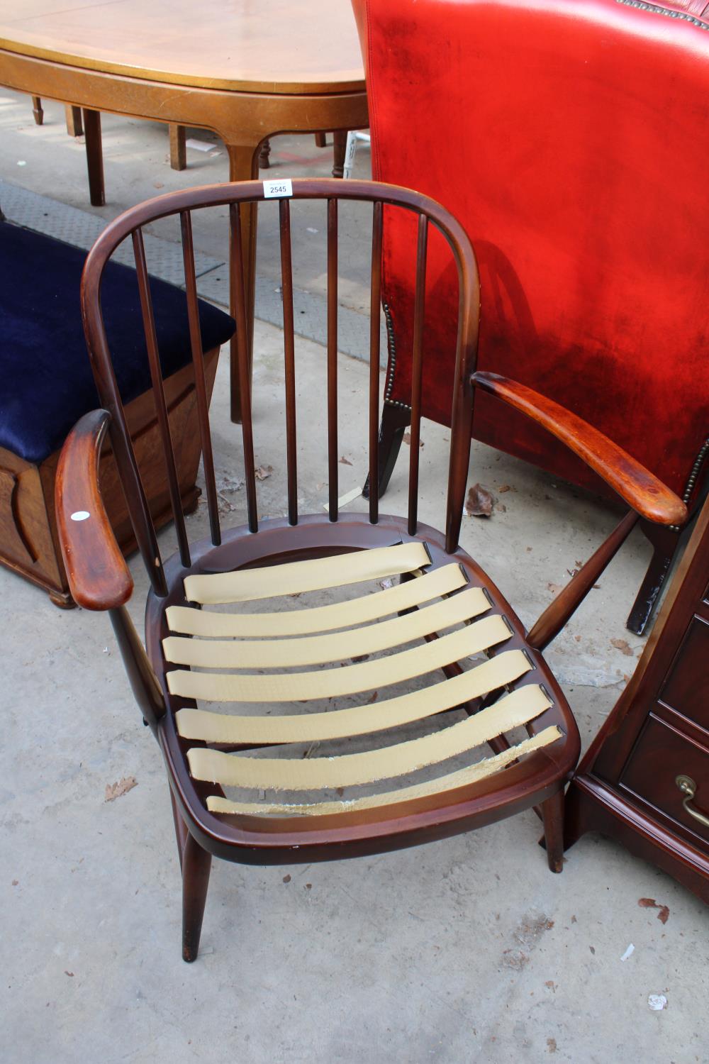 AN ERCOL STYLE FIRESIDE CHAIR WITH SPINDLE BACK - Image 3 of 3