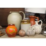 A QUANTITY OF STONEWARE JUGS WITH A VINTAGE STORAGE JAR PLUS A FOSTERS POTTERY VASE