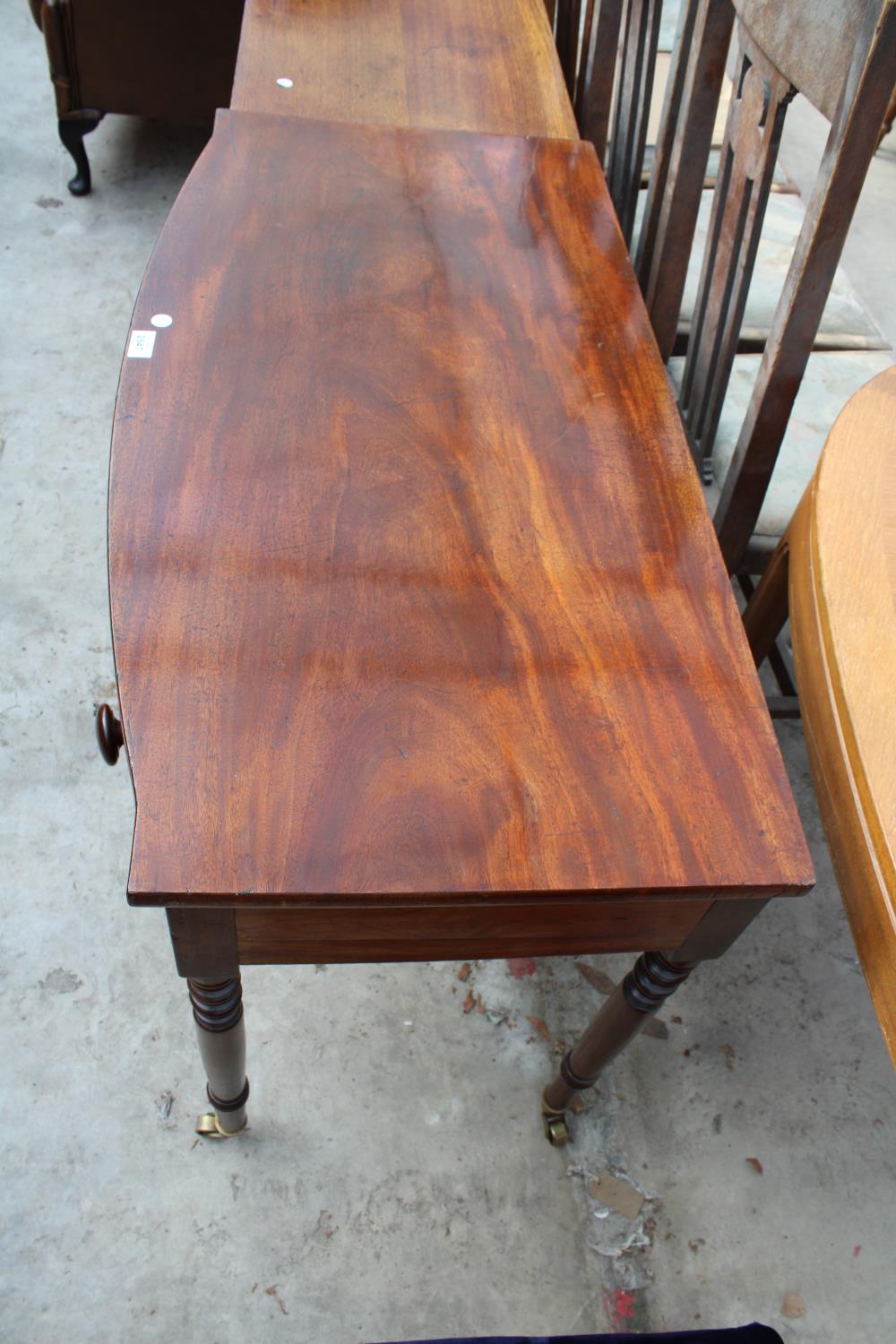A 19TH CENTURY MAHOGANY BOW-FRONTED SIDE-TABLE WITH SINGLE DRAWER ON TURNED LEGS, 39.5" WIDE - Image 3 of 5
