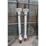 A PAIR OF DECORATIVE MID TO LATE 19TH CENTURY SCUMBLE PINE AND OAK PORCH POSTS WITH UPPER SCONCES (