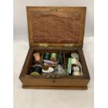 AN 1883 VICTORIAN SEWING BOX WITH CONTENTS
