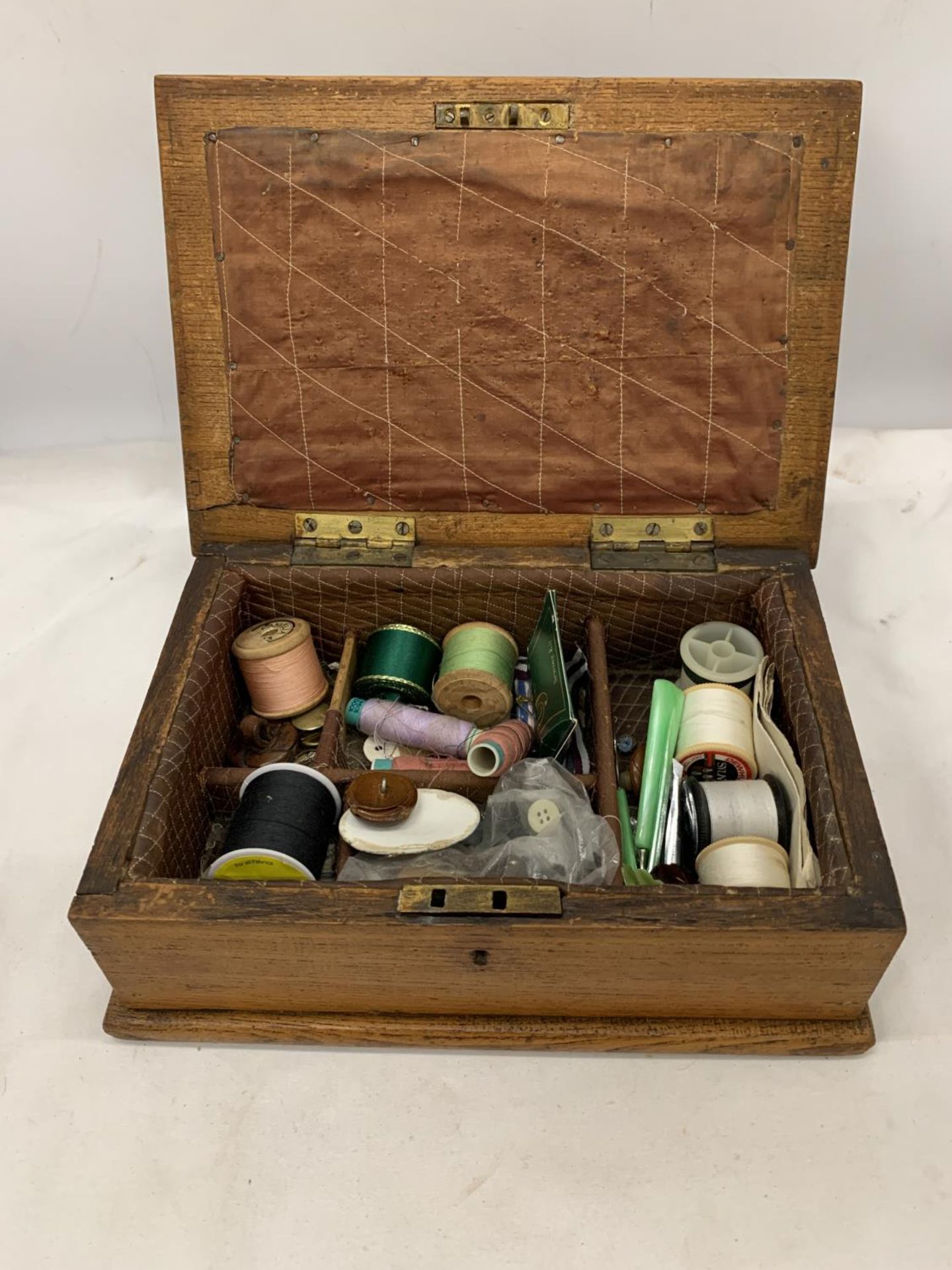 AN 1883 VICTORIAN SEWING BOX WITH CONTENTS