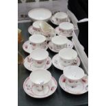 A FLORAL PART TEASET TO INCLUDE CUPS, SAUCERS, LARGE SUGAR BOWL PLUS JUG