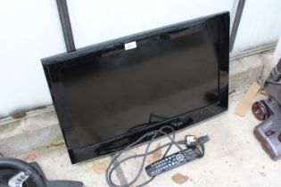 A SAMSUNG 26" TELEVISION WITH REMOTE CONTROL