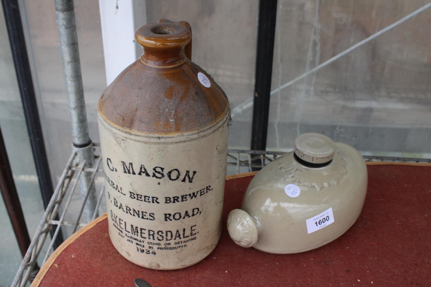 A VINTAGE C.MASON SKELMERSDALE FLAGGON AND A STONEWARE HOT WATER BOTTLE