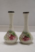 A PAIR OF VINTAGE FLORAL VSES WITH HALLMARKED SILVER RIMS, HEIGHT 18CM