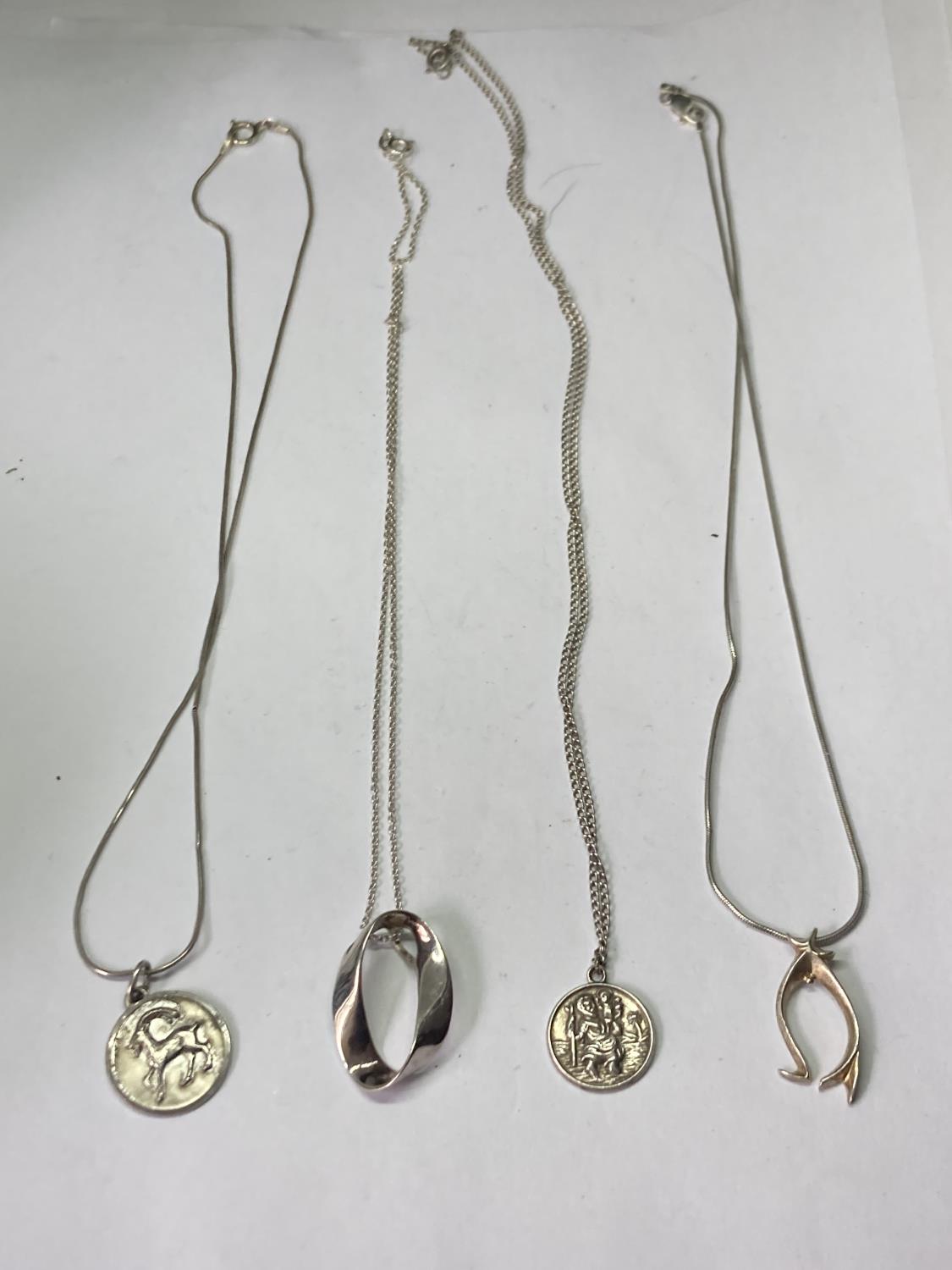 FOUR SILVER NECKLACES WITH PENDANTS