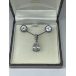 A SILVER SOLITAIRE NECKLACE AND EARRING SET