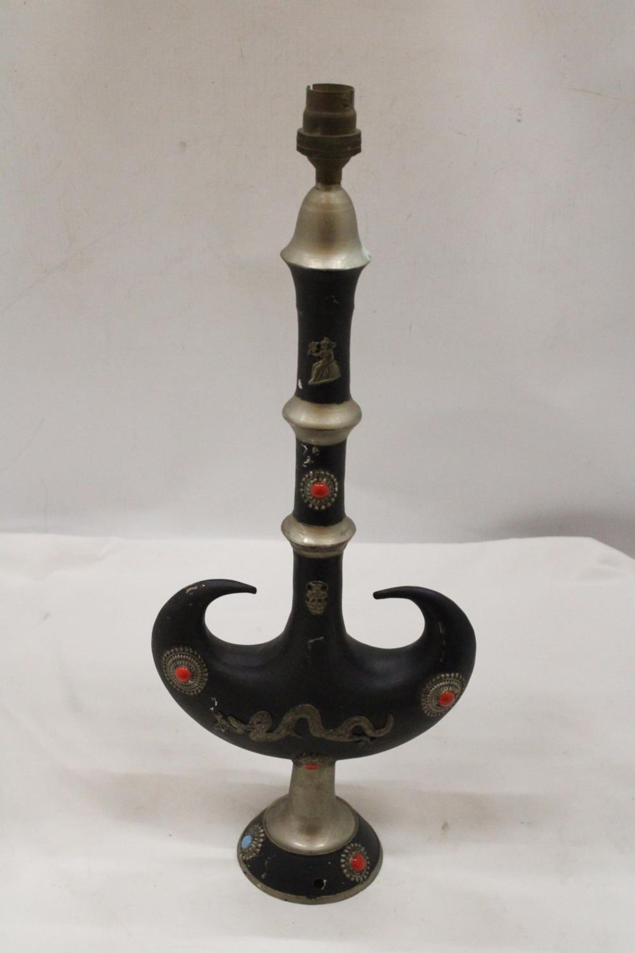 AN ORIENTAL METAL FESTOONED DRAGON LAMP - 19 INCH (H)