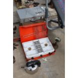A CAMPING STOVE, A KETTLE AND TOOL BOXES ETC