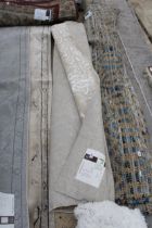 A BELIEVED AS NEW MADE IN TURKEY WHITE AND CREAM PATTERNED RUG (215CM x 305CM)