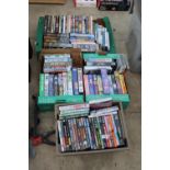 A LARGE ASSORTMENT OF DVDS AND VHS VIDEOS
