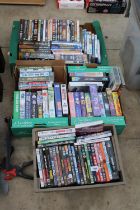 A LARGE ASSORTMENT OF DVDS AND VHS VIDEOS