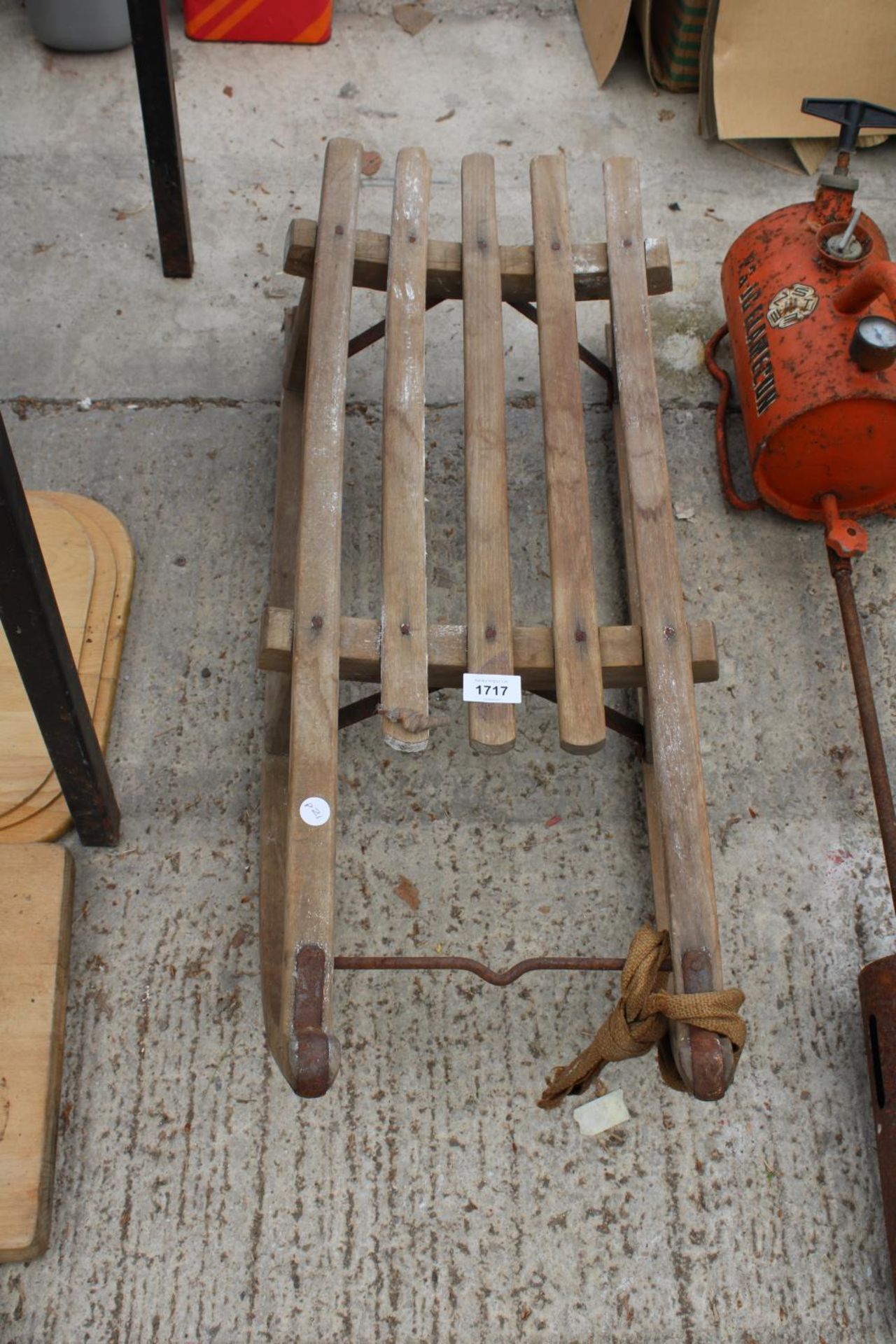 A VINTAGE WOODEN SLATTED CHILDS SLEDGE