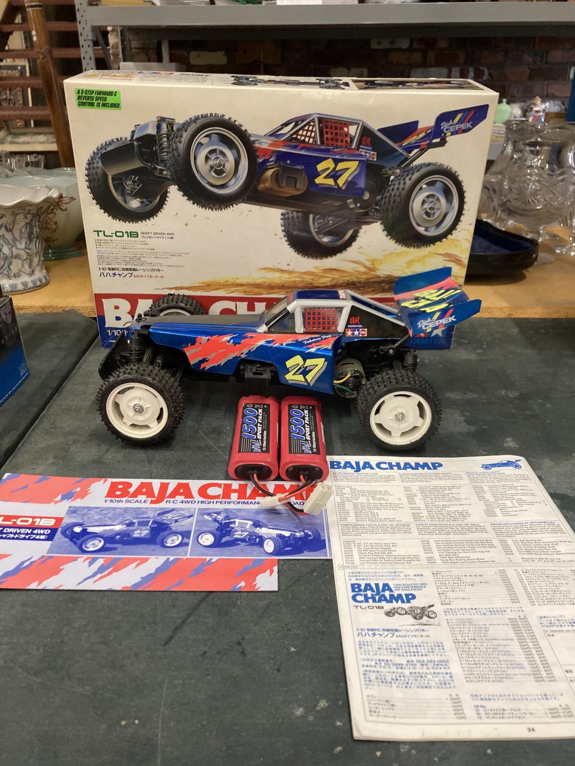 A TAMIYA BAJA CHAMP 1/10TH SCALE R/C 4WD HIGH PERFORMANCE OFF ROAD RACER (NO CONTROLLER PRESENT)