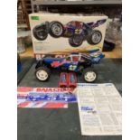 A TAMIYA BAJA CHAMP 1/10TH SCALE R/C 4WD HIGH PERFORMANCE OFF ROAD RACER (NO CONTROLLER PRESENT)